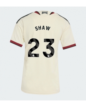 Manchester United Luke Shaw #23 Maglia Gara Terza Repliche 2026-27 Donna Maniche Corte Manchester United Luke Shaw #23 Maglia Gara Terza Repliche 2026-27 Donna Maniche Corte